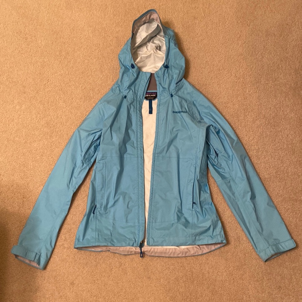 Blue Patagonia rain jacket